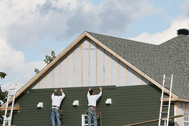 Professional Storm Damage Siding Repair technician working in Millington, MD